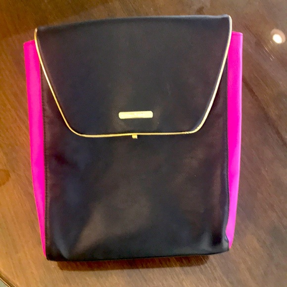 could not be JUICY COUTURE Handbags - JUICY COUTURE backpack. May b copy. Jet black/Hot pink. Tags n pics. Snap sides